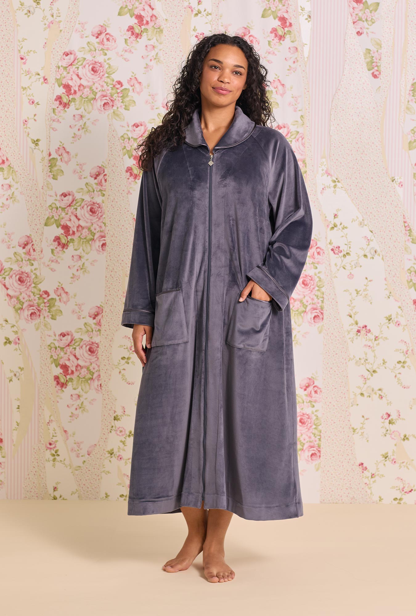 A lady wearing Lux Velour Long Zip Robe
