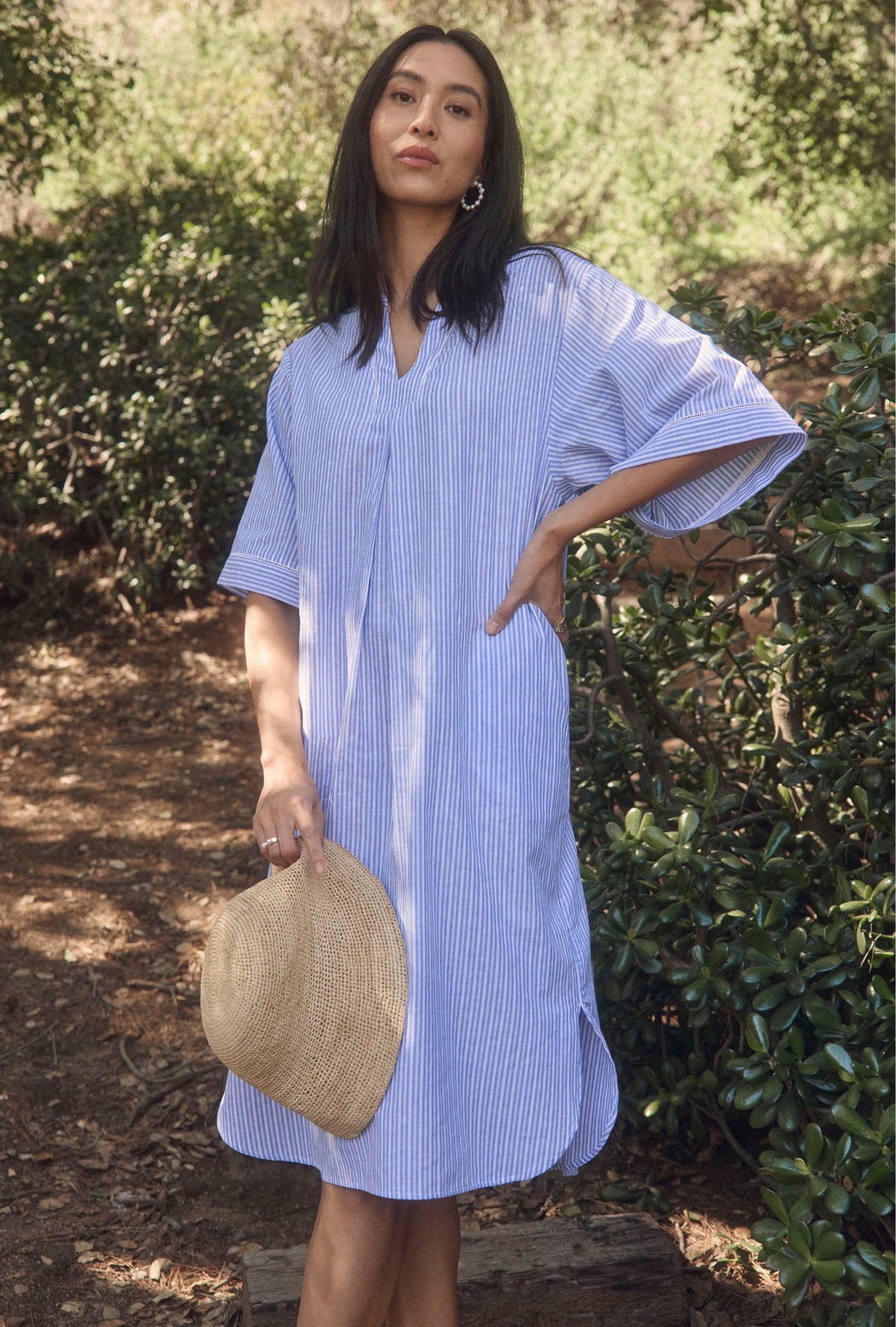 A lady wearing The &quot;Lana&quot; Classic Cotton Stripe Caftan