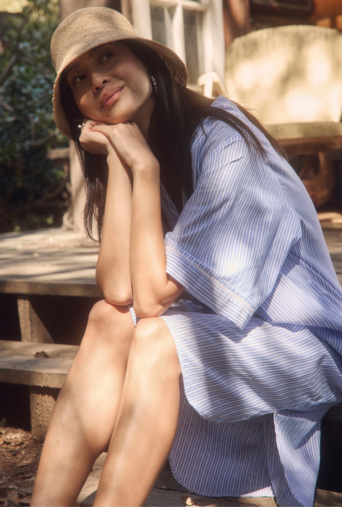 A lady wearing The &quot;Lana&quot; Classic Cotton Stripe Caftan