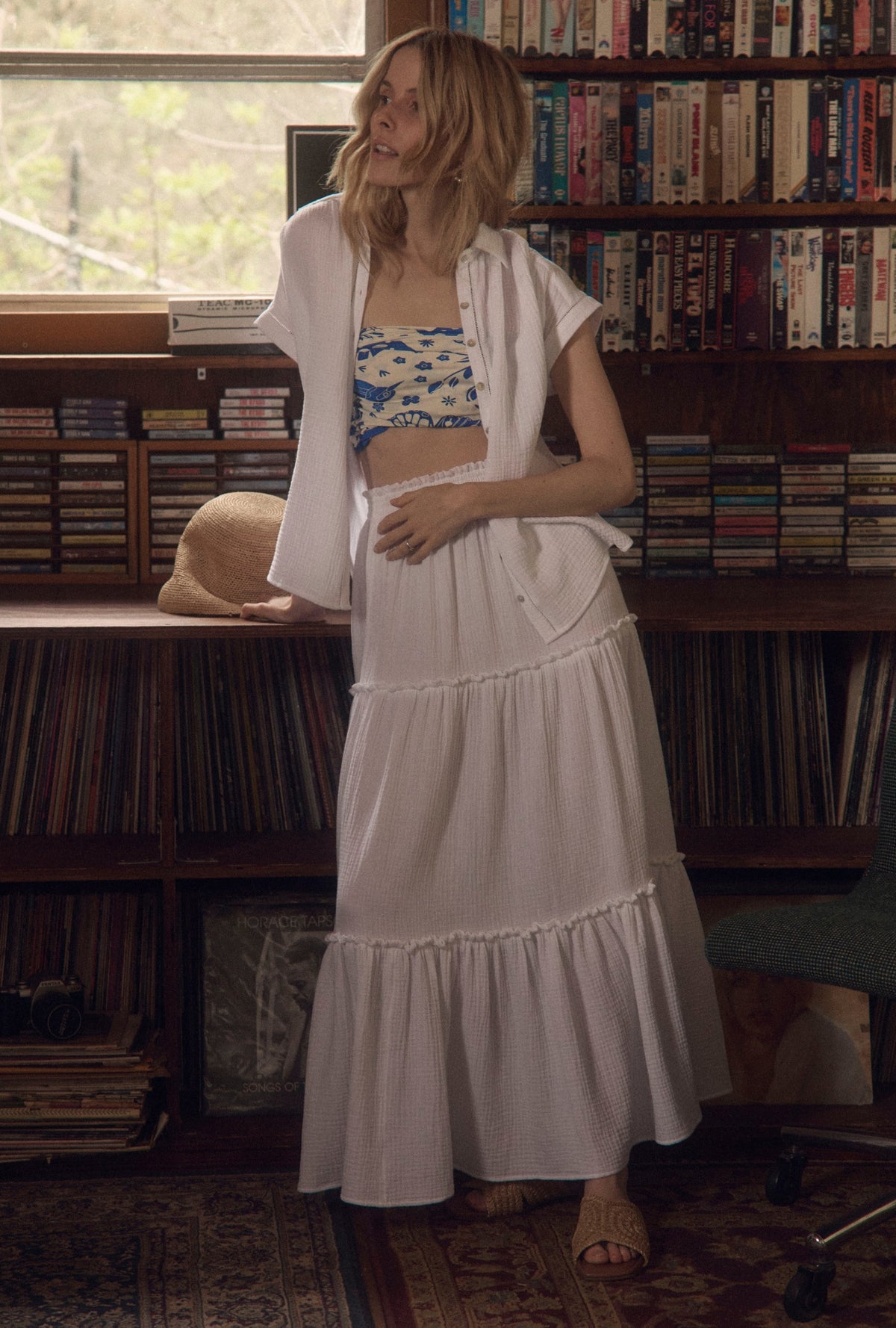 A lady wearing The &quot;Marina&quot; White Crinkle Gauze Maxi Skirt