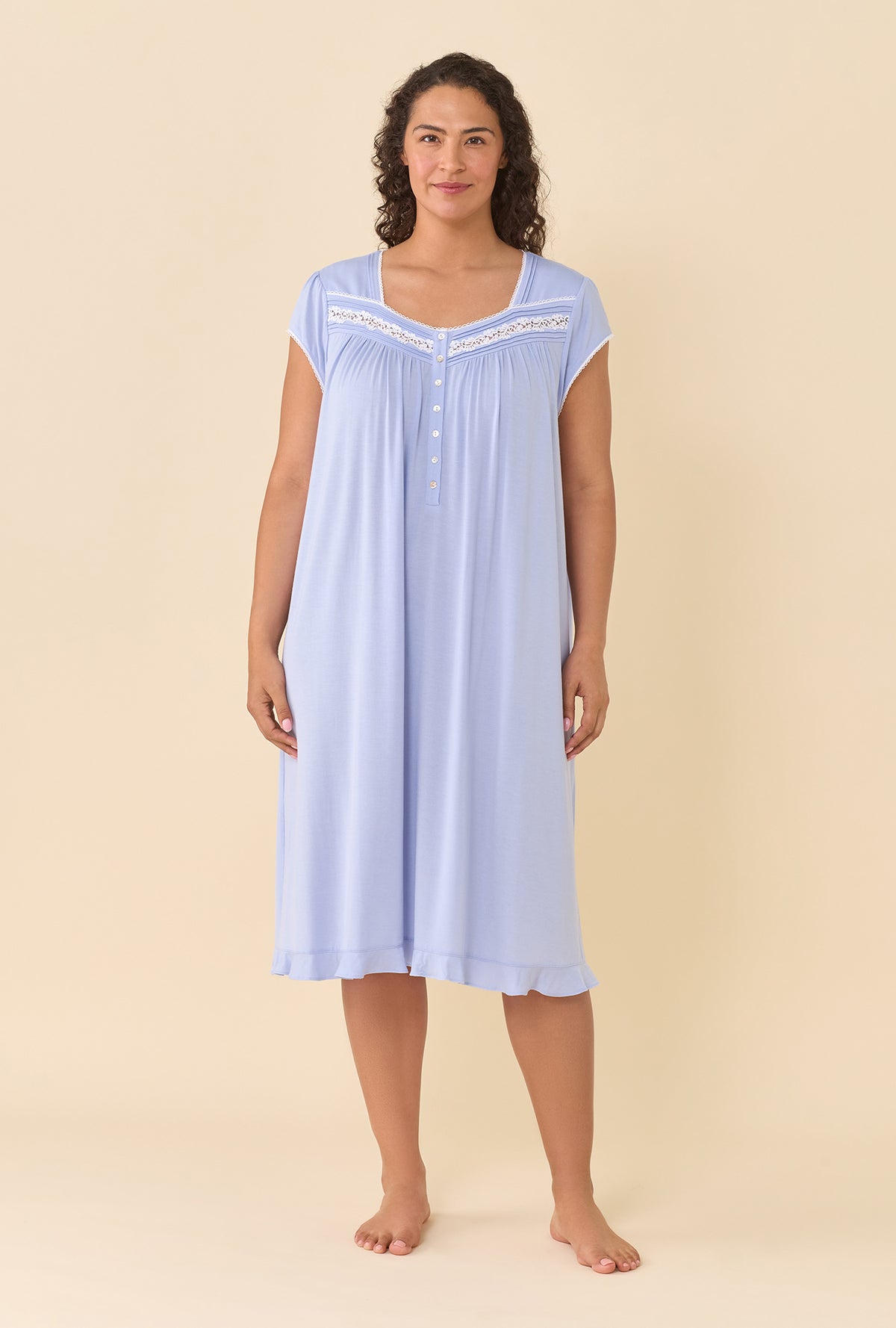 A lady wearing plus size Peri Nightgown