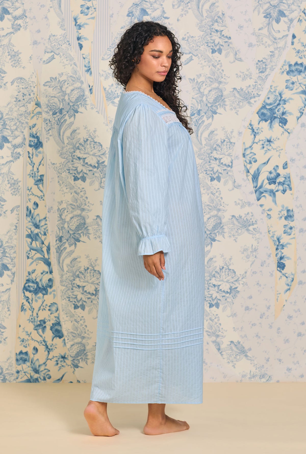 A lady wearing Dobby Stripe Button Front Robe