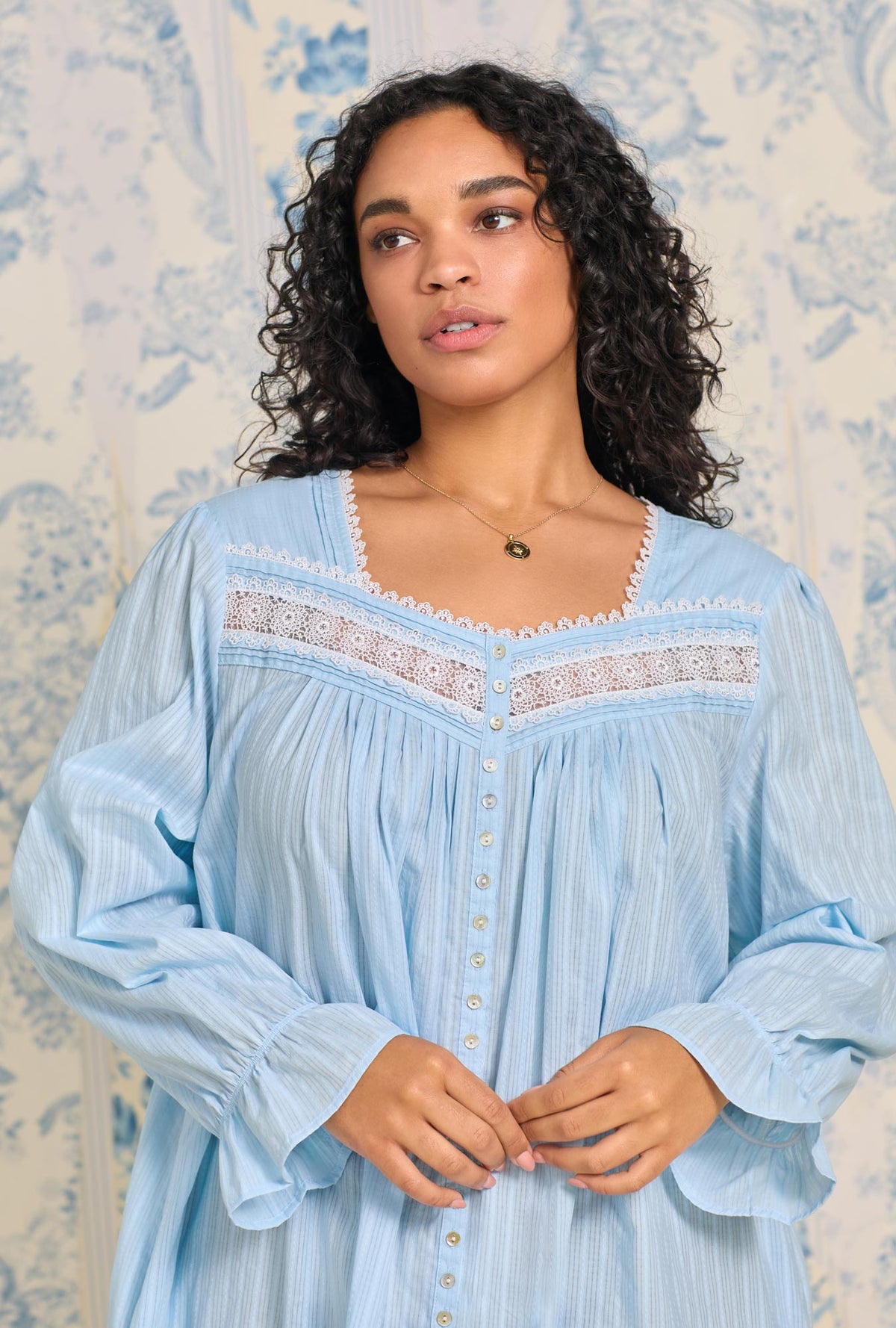 A lady wearing Dobby Stripe Button Front Robe