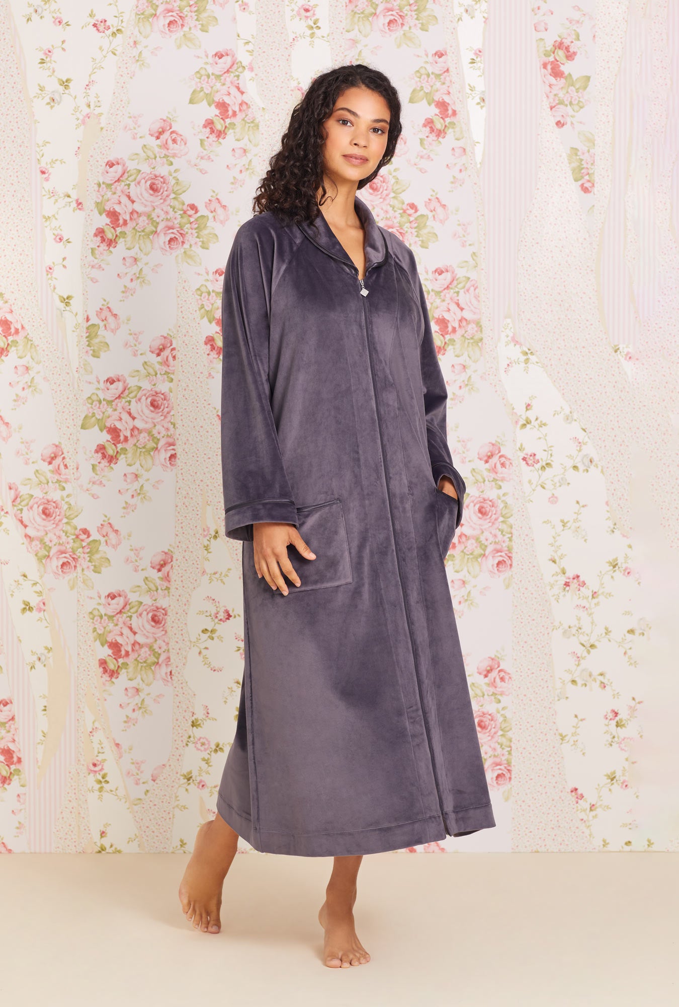 A lady wearing Lux Velour Long Zip Robe