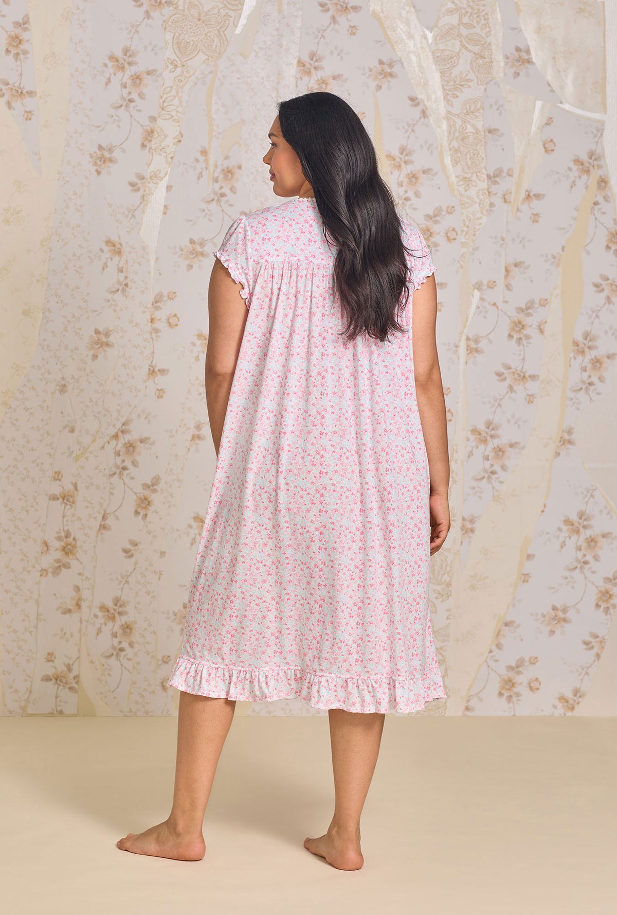 A lady wearing Bright Blossom Modal Waltz Plus Gown