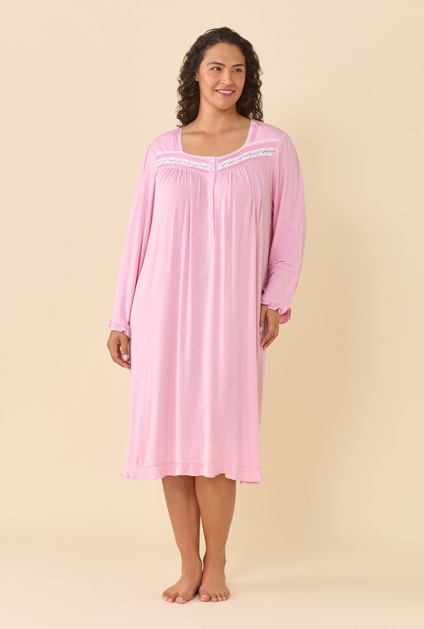 A lady wearing Dusty Rose Long Sleeve Nightgown looking down
