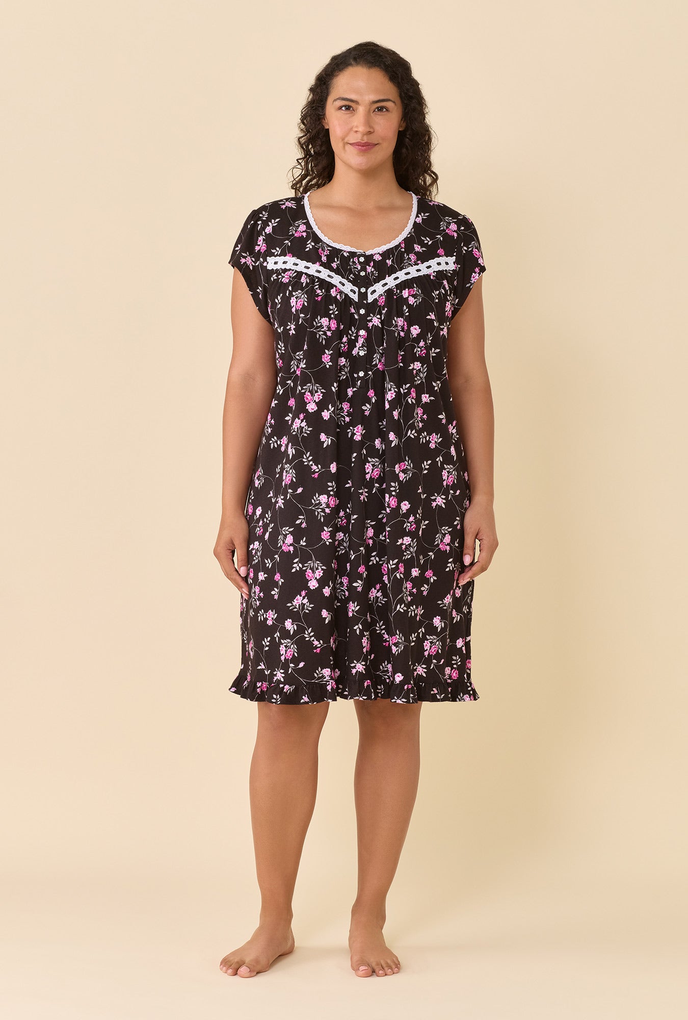 A lady wearing Vintage Vine Cap Sleeve Chemise near window