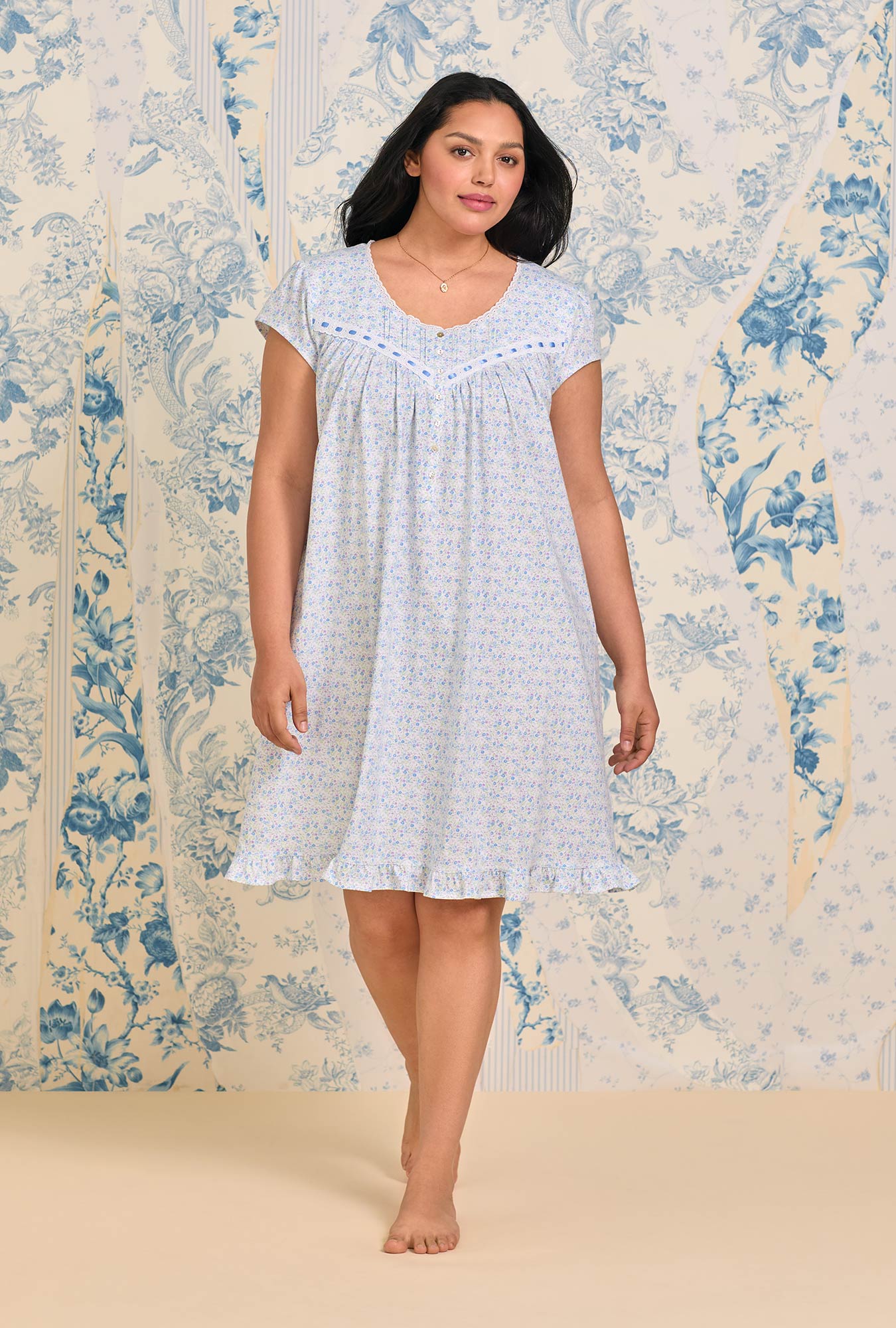 A lady wearing Blue Ditsy Cotton Knit Cap Sleeve Chemise
