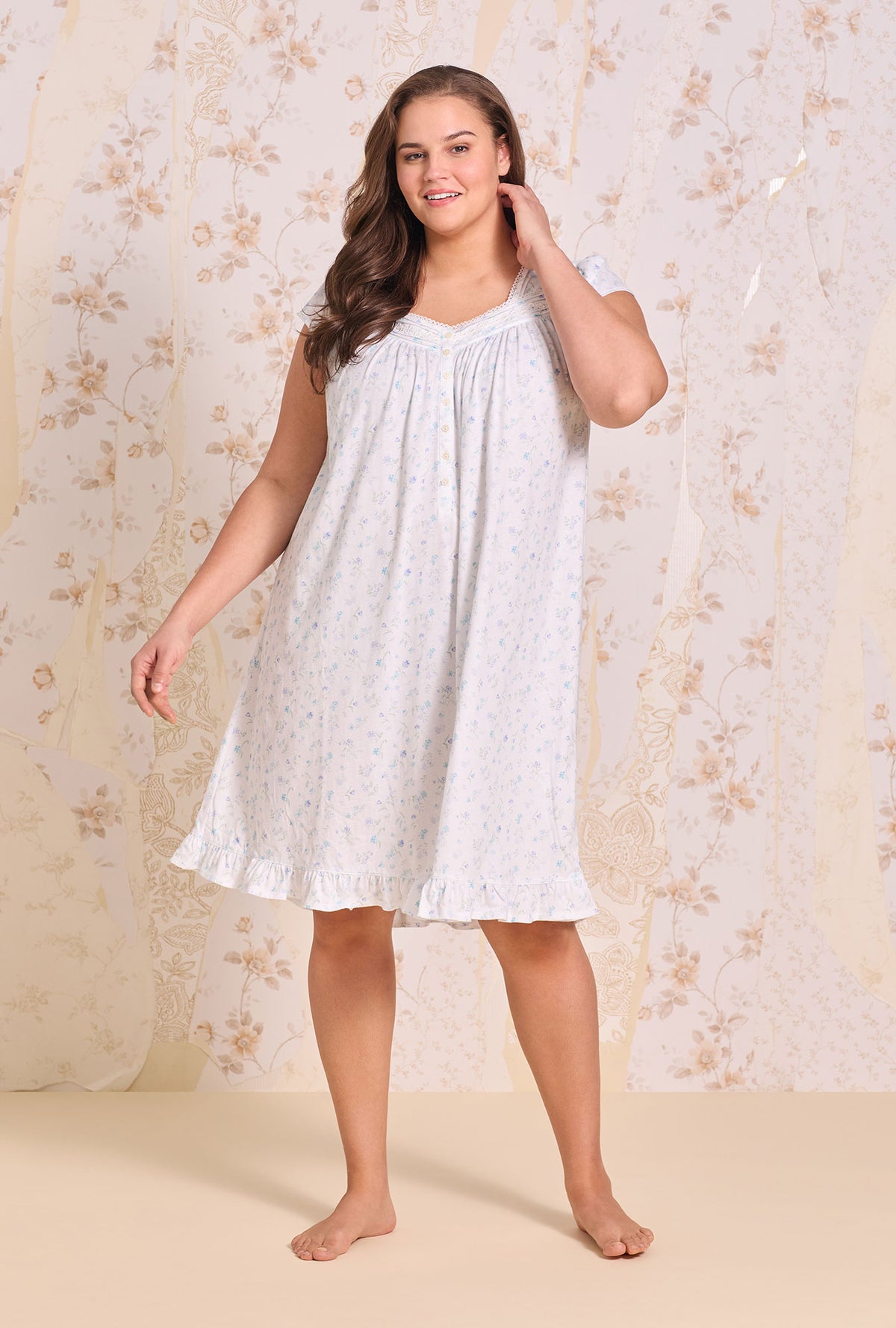 A lady wearing plus size White Meadow Cotton Knit Cap Sleeve Waltz Nightgown