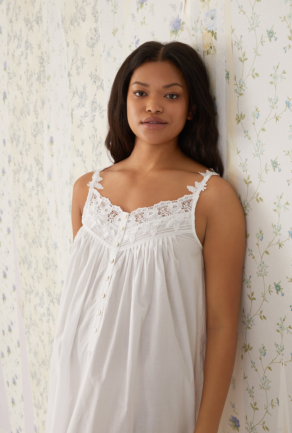 A lady wearing white Florentine Lace Ballet Gown