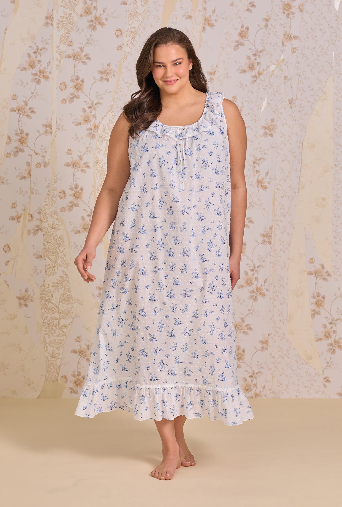 A lady wearing The "Rosalie" Sonoma Garden Cotton Swiss Dot Ballet Nightgown looking side