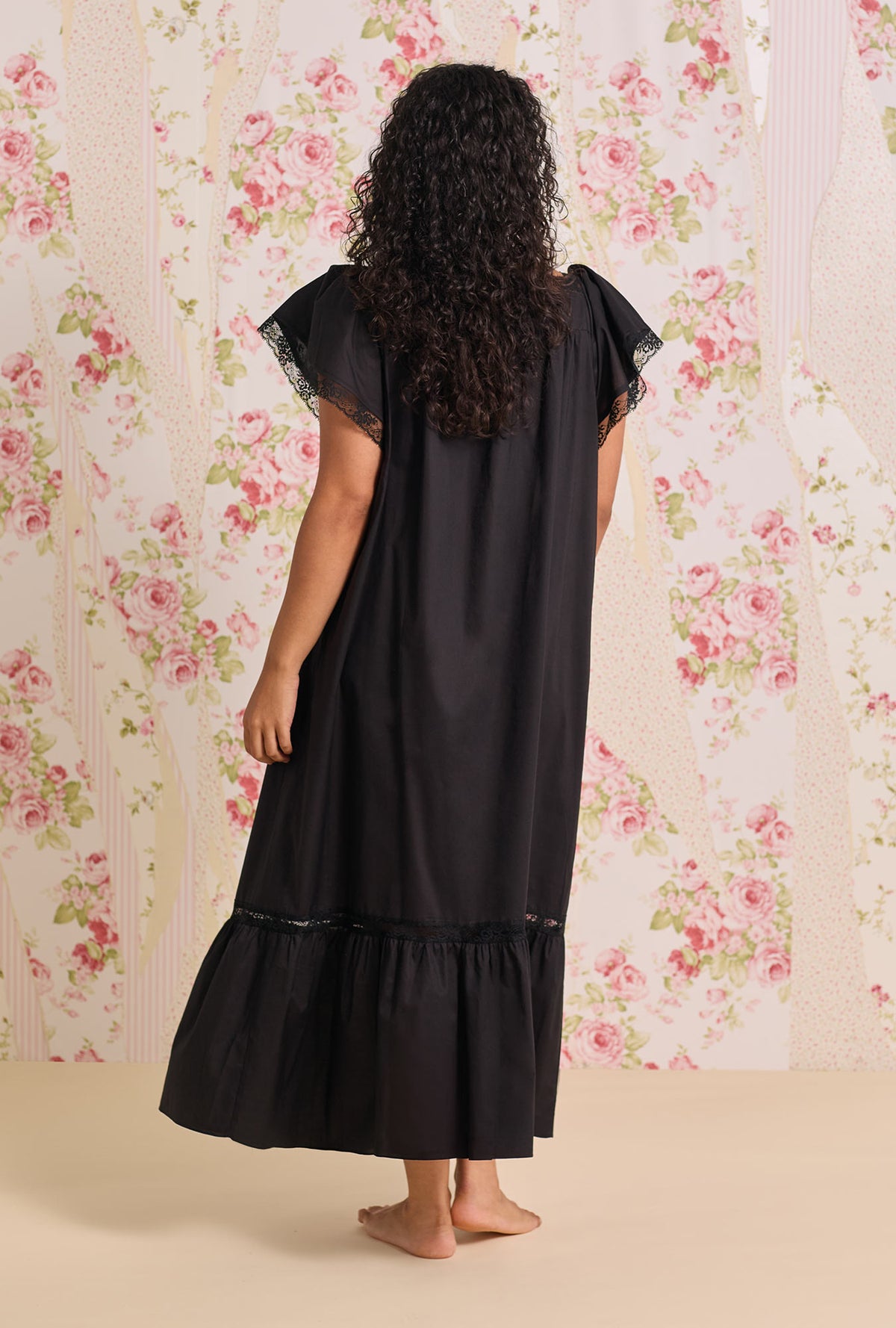 A Lady wearing The "Grace" Iconic Black Plus Cotton Lawn  Flutter Sleeve Ballet Nightgown