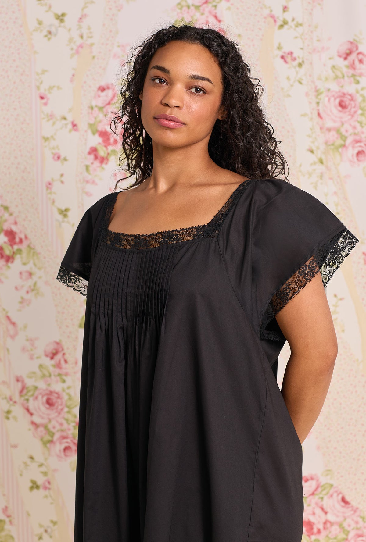 A Lady wearing The "Grace" Iconic Black Plus Cotton Lawn  Flutter Sleeve Ballet Nightgown