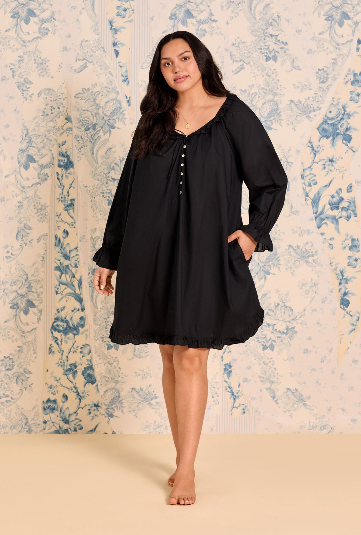 A lady wearing Iconic Black Cotton Lawn Poet Plus Shirt
