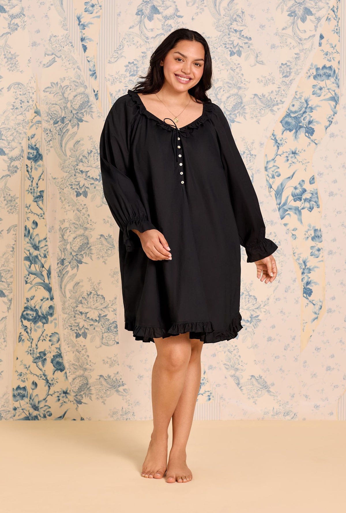 A lady wearing Iconic Black Cotton Lawn Poet Plus Shirt