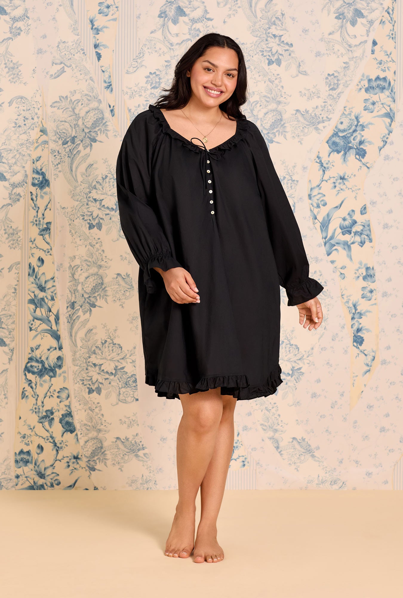 A lady wearing Iconic Black Cotton Lawn Poet Shirt