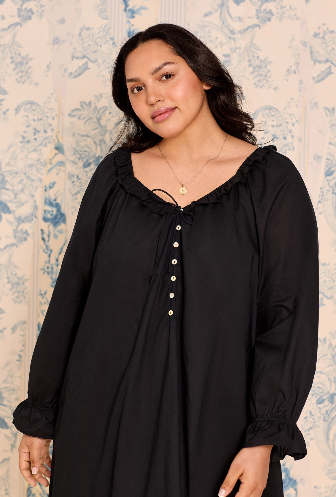 A lady wearing Iconic Black Cotton Lawn Poet Shirt