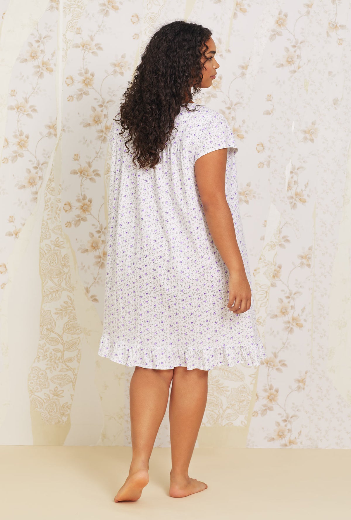 A lady wearing  plus size white short sleeve  Cotton Knit Nightgown with Lavender Garden  print