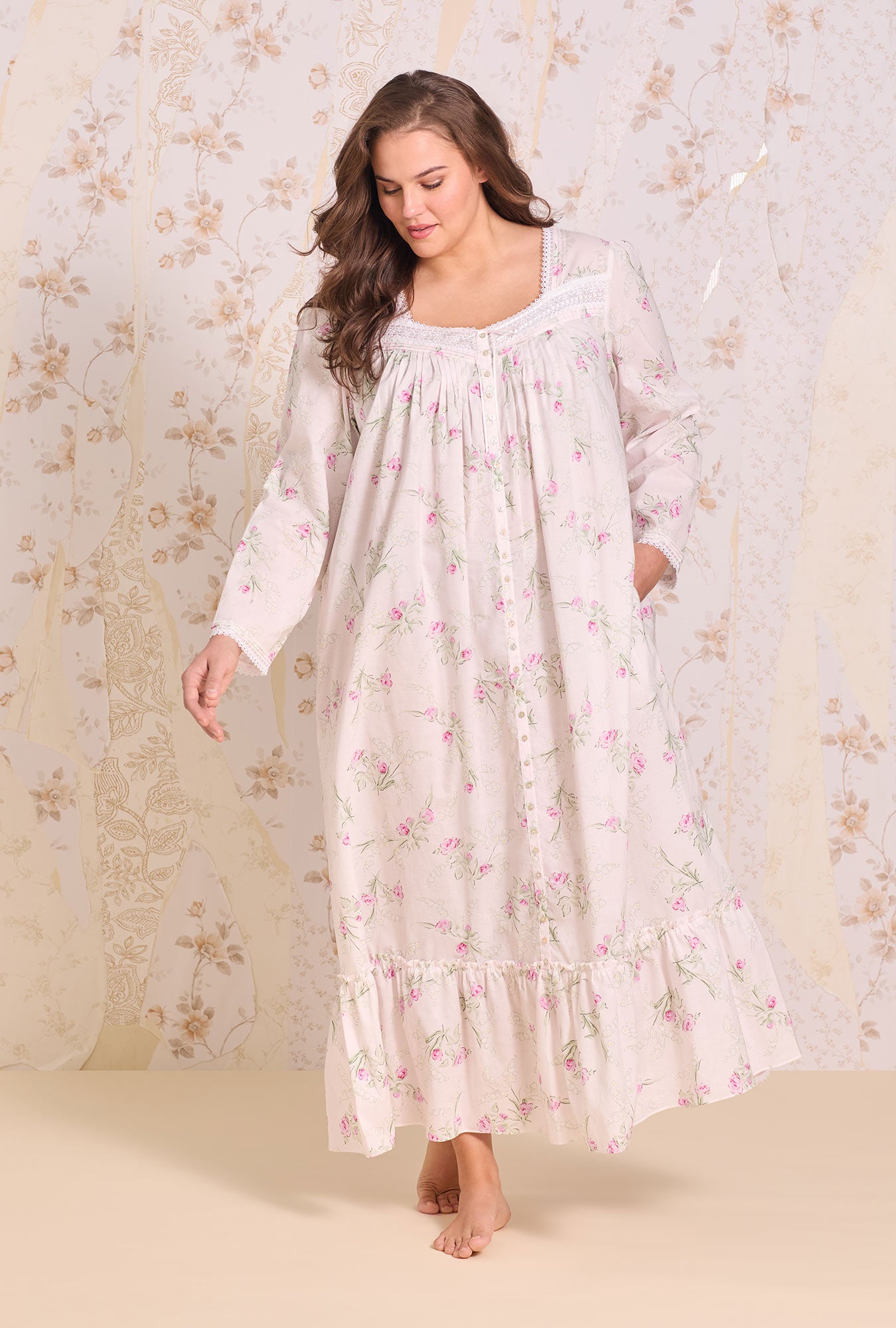 A lady wearing Blush Bouquet Cotton Lawn Button Front Robe