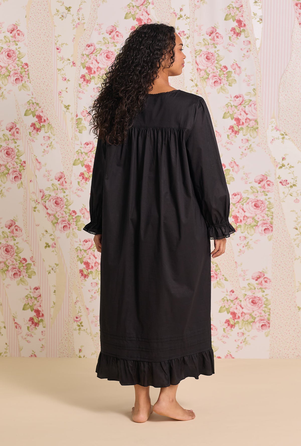 A Lady wearing Iconic Black Cotton Lawn Long Sleeve Baller Plus Nightgown