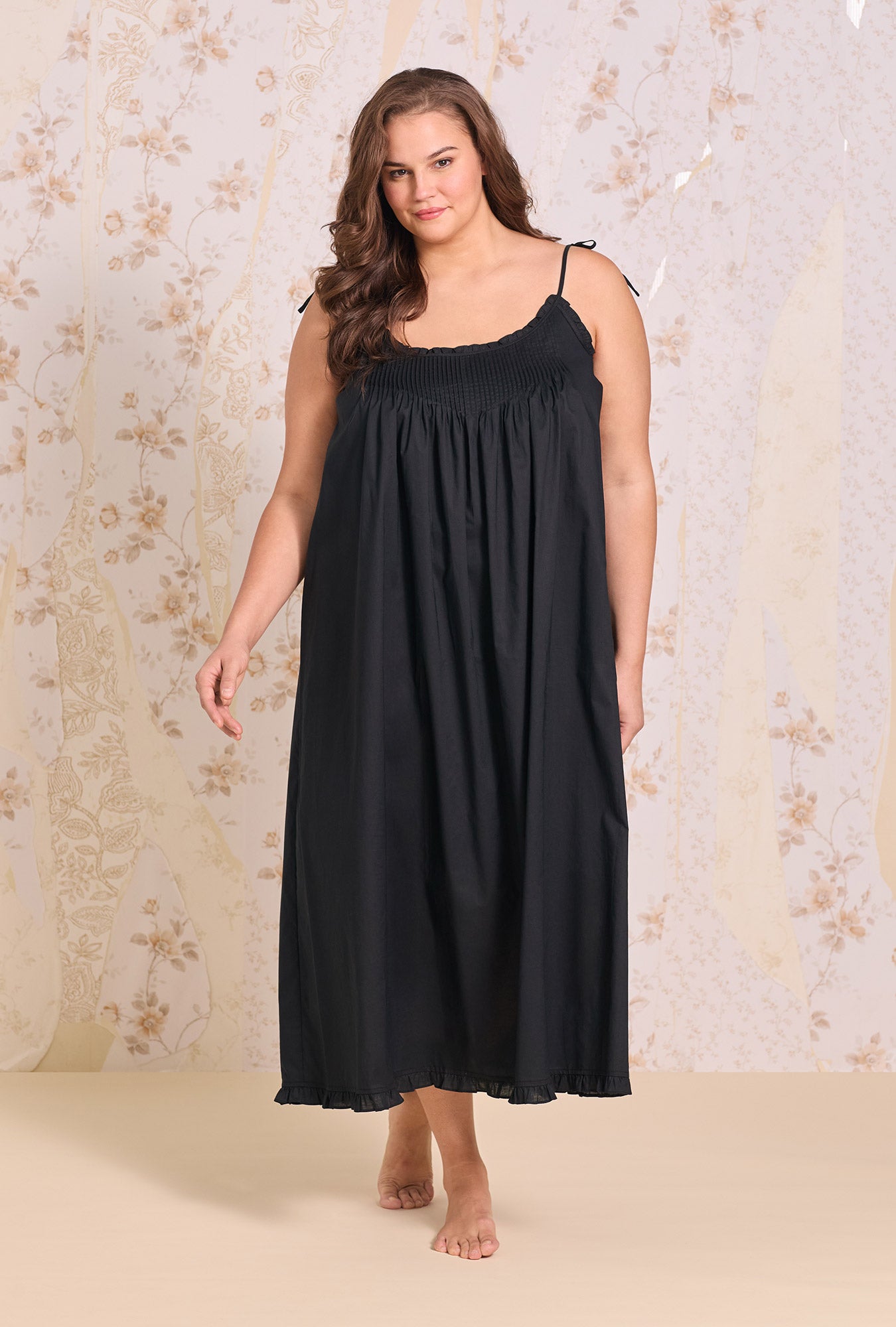 A Lady wearing The "Lucille" Iconic Black Cotton Lawn Ballet Nightgown