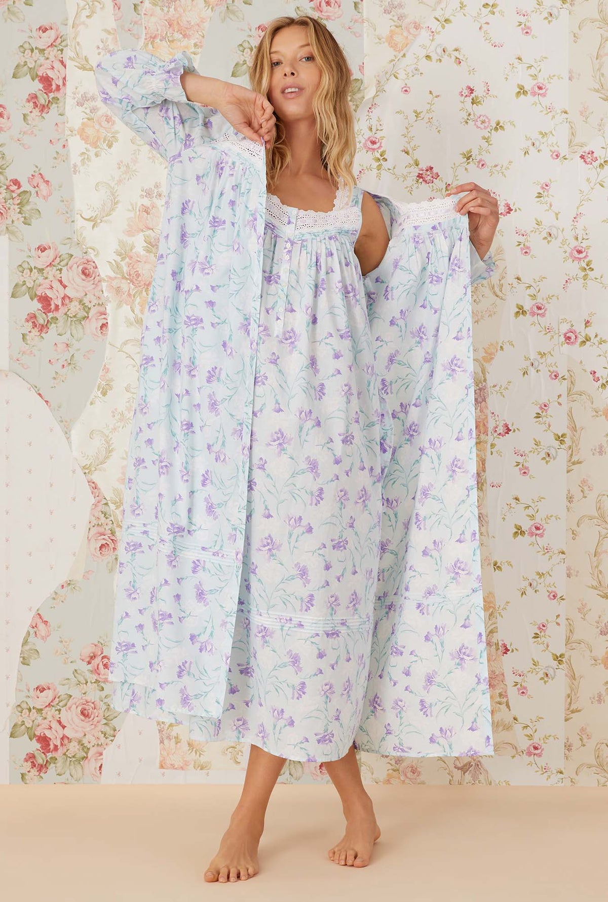 A lady wearing white sleeveless Eileen Nightgown with lavender carnations print