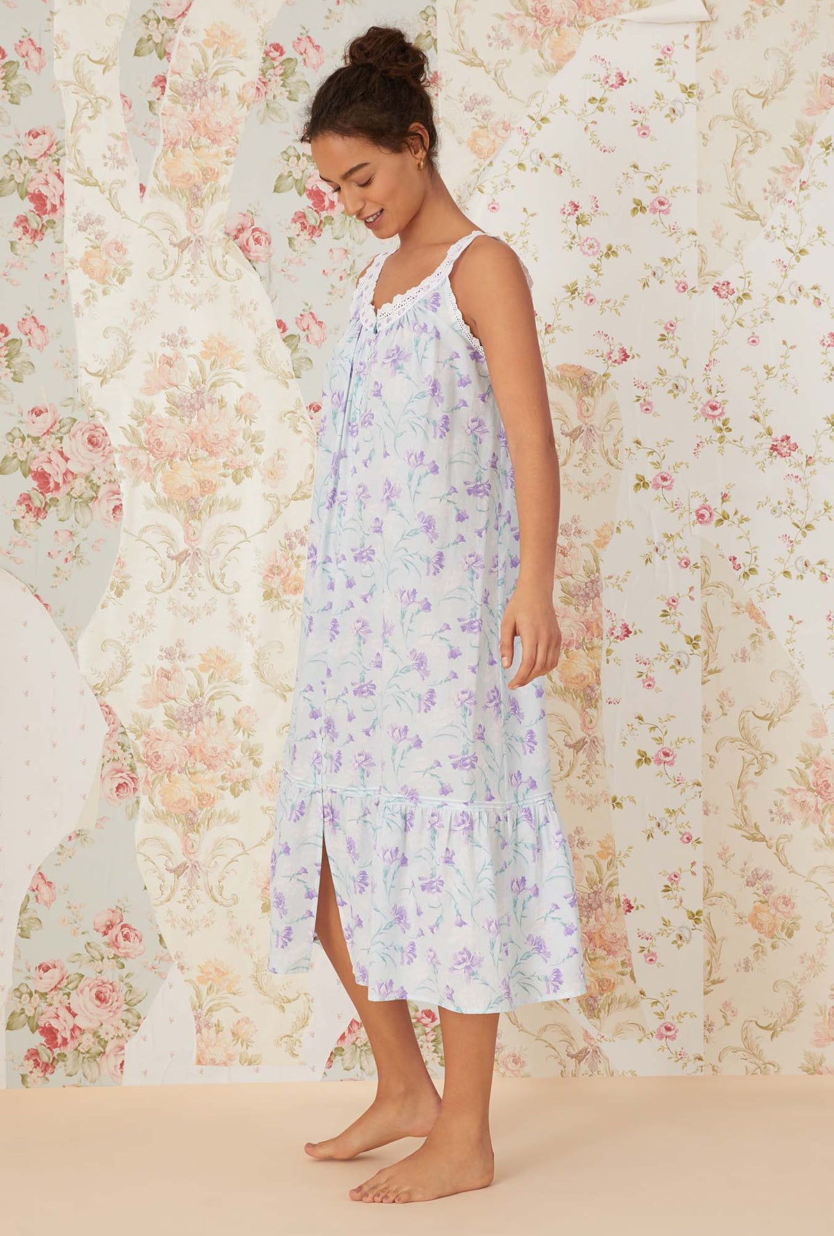 A lady wearing white sleeveless shelby Nightgown with lavender carnations print
