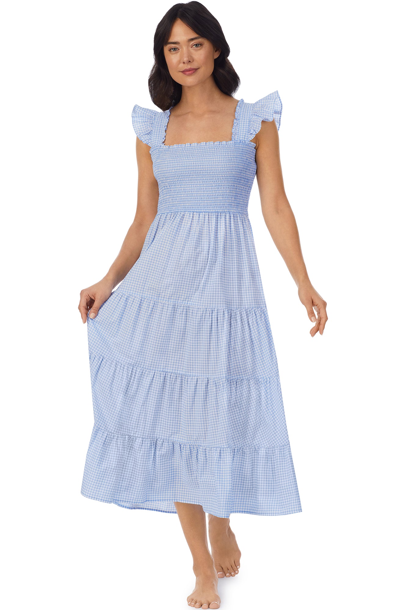 A lady wearing a blue butterfly sleeve Dress with white check pattern