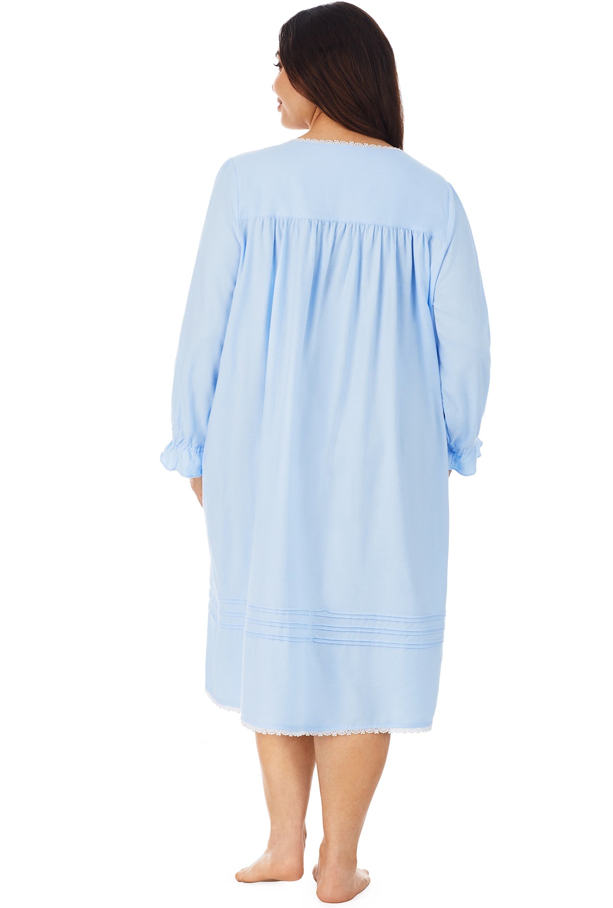 A lady wearing a heavenly blue long sleeve rayon lightweight flannel waltz nightgown plus.