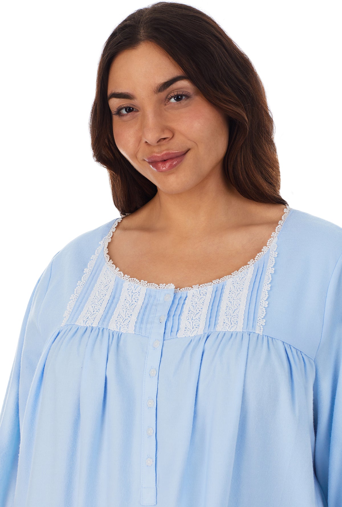 A lady wearing a heavenly blue long sleeve rayon lightweight flannel waltz nightgown plus.