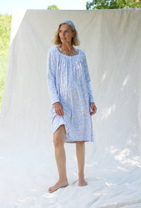 A lady wearing a dream fleece long sleeve waltz nightgown.