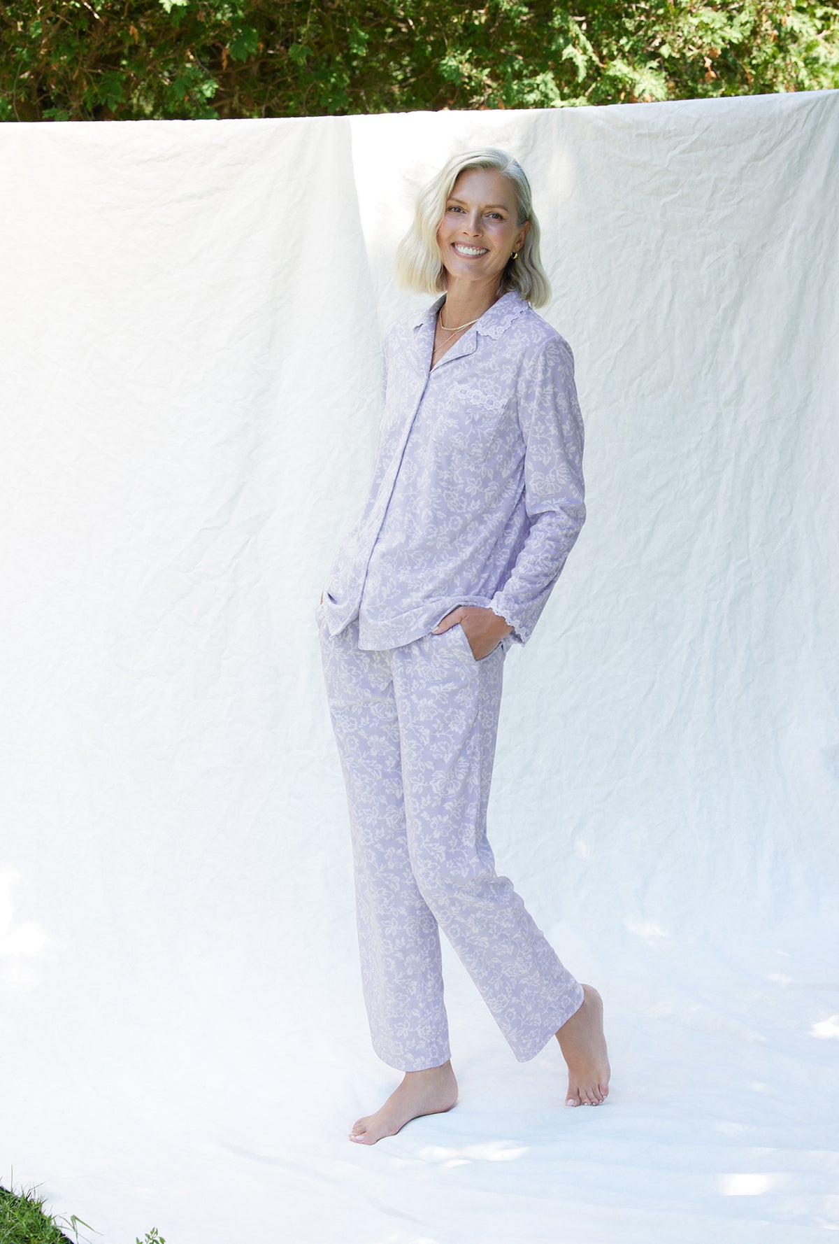 A lady wearing a dream fleece long sleeve long pajama.