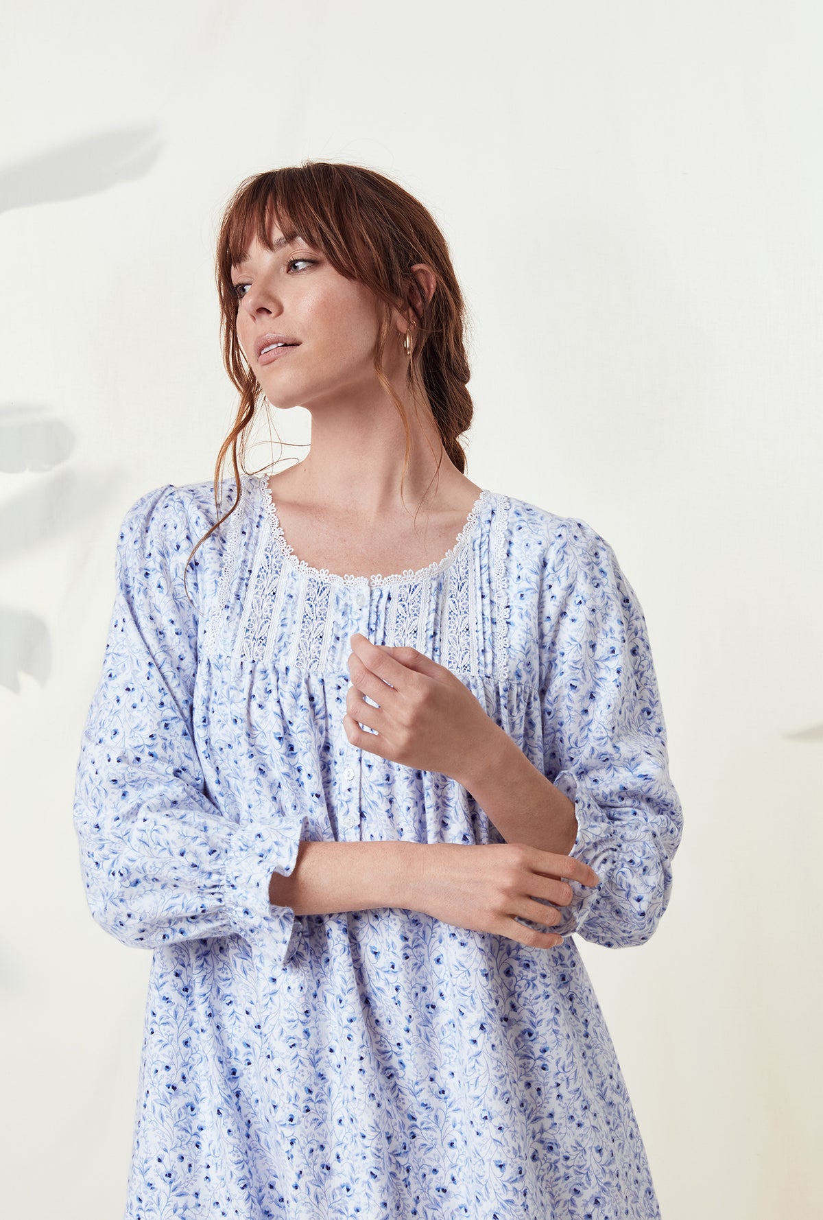 A lady wearing a hevenly rose long sleeve rayon lightweight flannel waltz nightgown.