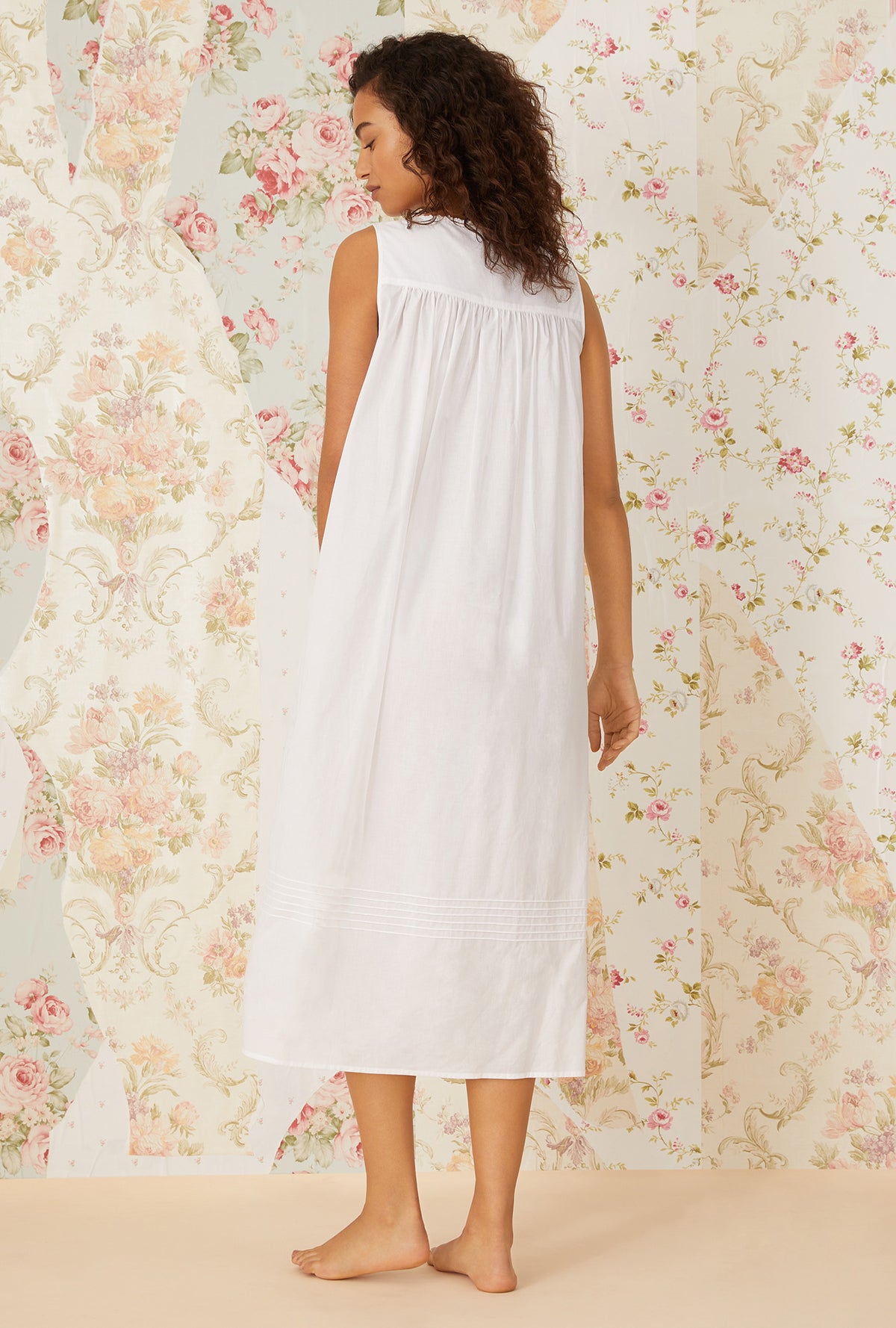A lady wearing Lace Daydream &quot;Eileen&quot; White Cotton Ballet Nightgown