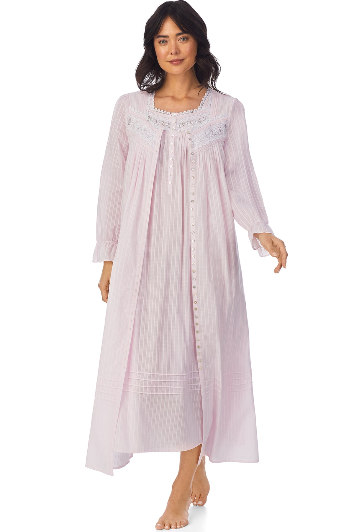 A lady wearing a pink dobby stripe long sleeve button front robe.