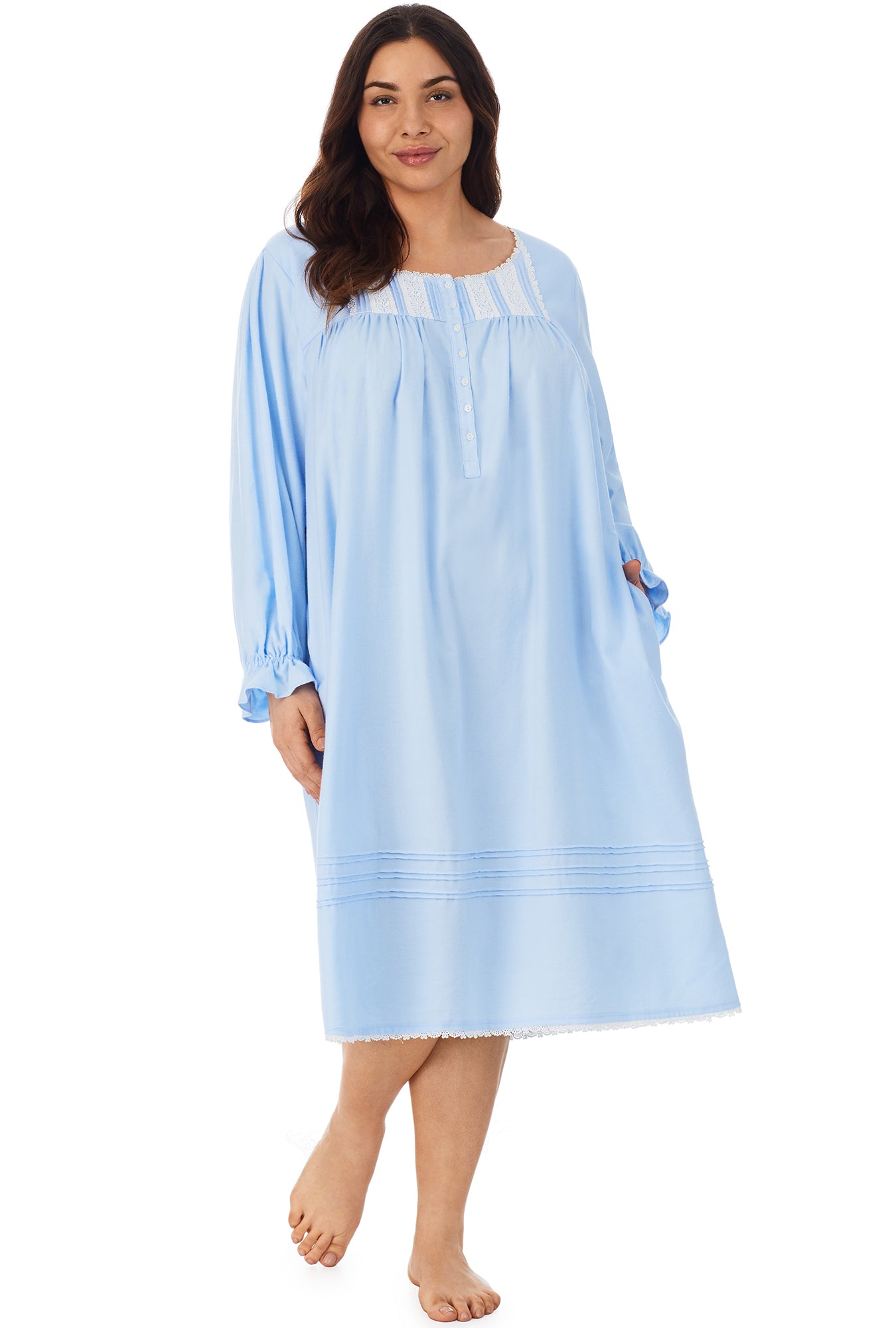 A lady wearing a heavenly blue long sleeve rayon lightweight flannel waltz nightgown.